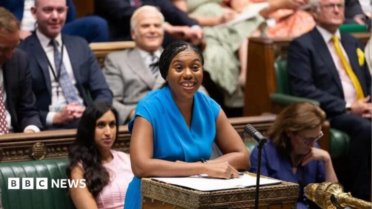 Badenoch won’t say sorry for language at fiery Commons session Kemi Badenoch in the House of Commons at the despatch box. She is wearing a blue dress and behind her are Conservative MPs.