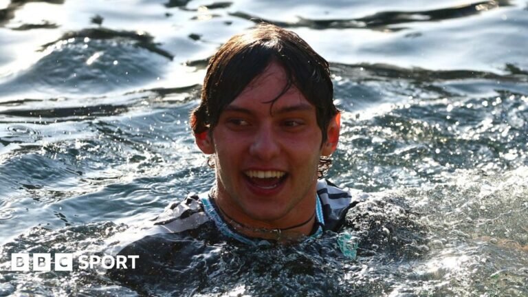 Race winner Kimi Antonelli swimming in the Monaco harbour after winning the grand prix