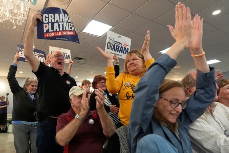 Supporters cheer for Platner at his town hall in Portland on June 7.