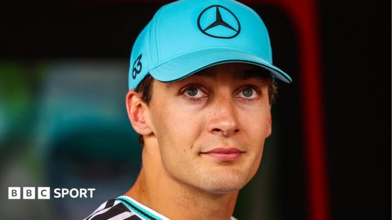 George Russell pictured wearing a Mercedes cap at the Monaco Grand Prix