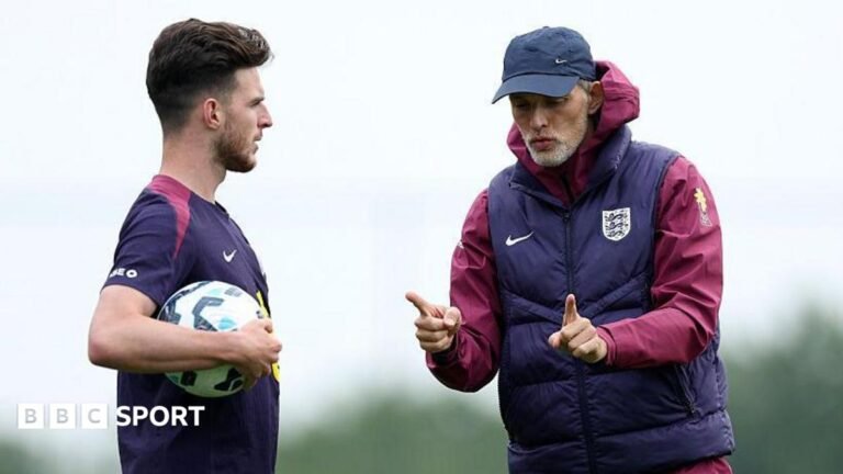 Declan Rice and Thomas Tuchel talking in England training