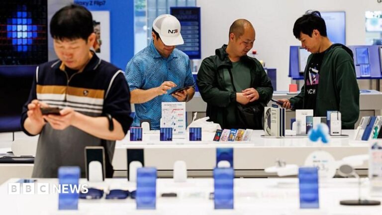 AI chip boom lifts Samsung profits by 1,800% Customers try Samsung smartphones at one of the company's stores in Seoul
