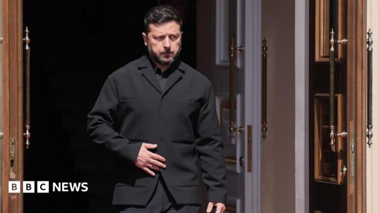 Andy Burnham pledges continued support for Ukraine ahead of Zelensky visit Zelensky, wearing a dark suit, walking through a doorway