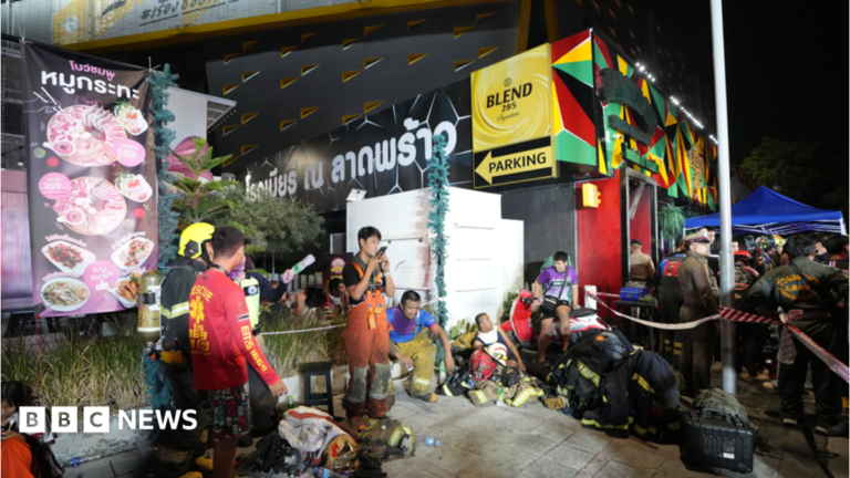 At least 27 killed in Bangkok bar fire, Thai authorities say Amelia Lord is a white woman in her late 20s. She has shoulder length brown hair partly pulled back in a ponytail with frontpieces either side of her face. She has defined eyebrows and is wearing makeup, has a central nose ring and earrings, and is smiling at the camera. She wears a sleeveless black top. She is holding a pair of books and stands in front of a bookshelf with collections of books on it, including titles by Rebecca Yarros and the Harry Potter series by JK Rowling.