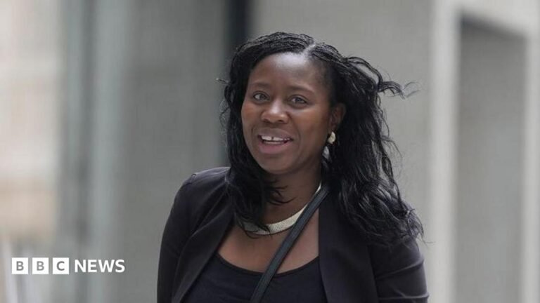 Burnham will deal with living costs in short term, adviser says Amelia Lord is a white woman in her late 20s. She has shoulder length brown hair partly pulled back in a ponytail with frontpieces either side of her face. She has defined eyebrows and is wearing makeup, has a central nose ring and earrings, and is smiling at the camera. She wears a sleeveless black top. She is holding a pair of books and stands in front of a bookshelf with collections of books on it, including titles by Rebecca Yarros and the Harry Potter series by JK Rowling.