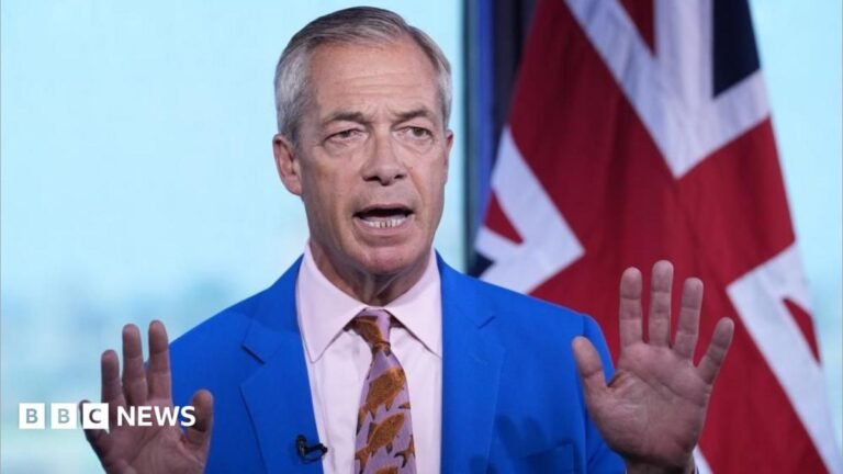 Chris Mason: Far from certain whether by-election strengthens Farage Nigel Farage is wearing a bright blue coloured suit jacket, white shirt and patterned tie. He is stood in front of a Union flag. His hands are held up in front of him.