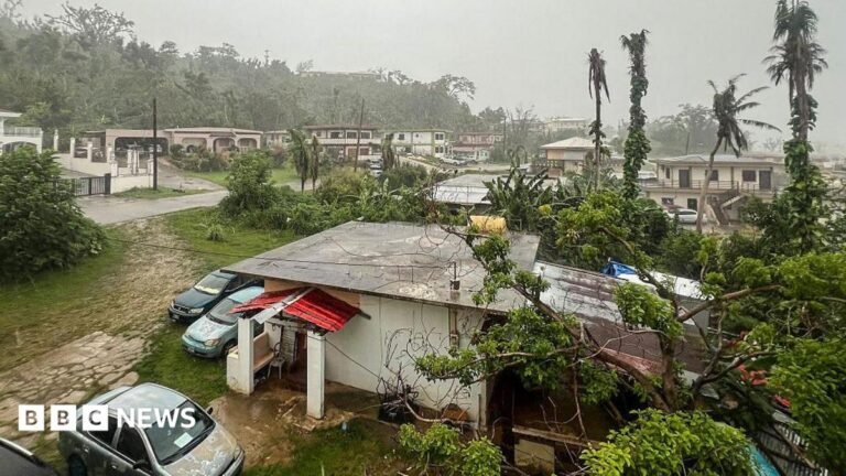 Evacuations in Guam as super typhoon Bavi approaches This picture shows a general view of a residential area as rain falls ahead of the arrival of the forecasted Super Typhoon Bavi in Saipan, Northern Mariana Islands, on July 5, 2026.