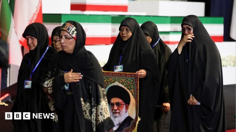 Iran begins public mourning for Ayatollah killed in February Georgia Finch and her husband on their wedding day