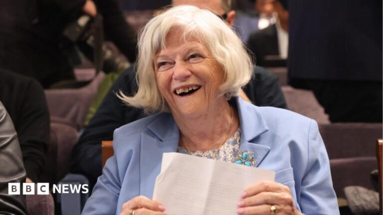 Maidstone MP calls for Ann Widdecombe memorial in Parliament Ann Widdecombe in a blue blazer, laughing.
