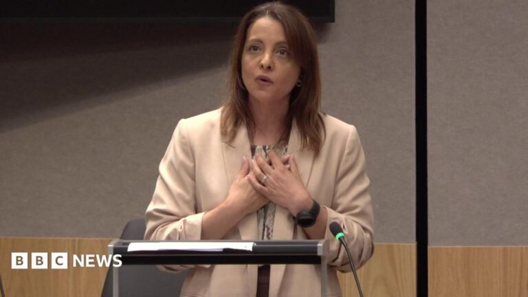 Majority of Senedd defends Nation of Sanctuary as Reform call for policy end A woman with shoulder-length blonde hair talks into a microphone