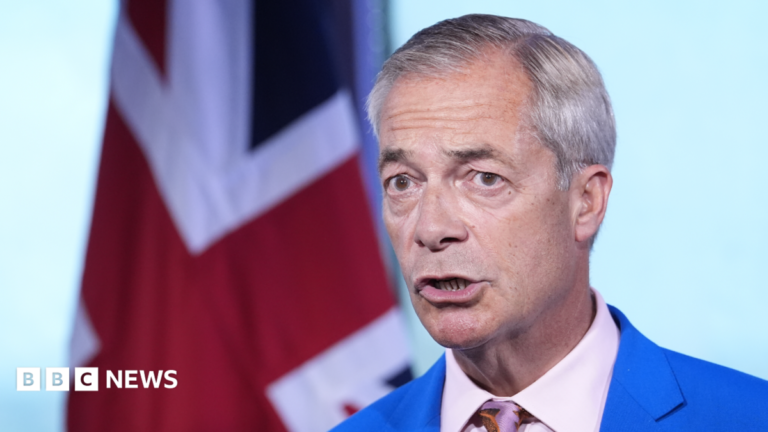 Reform UK leader Nigel Farage makes a statement with a union jack in the background