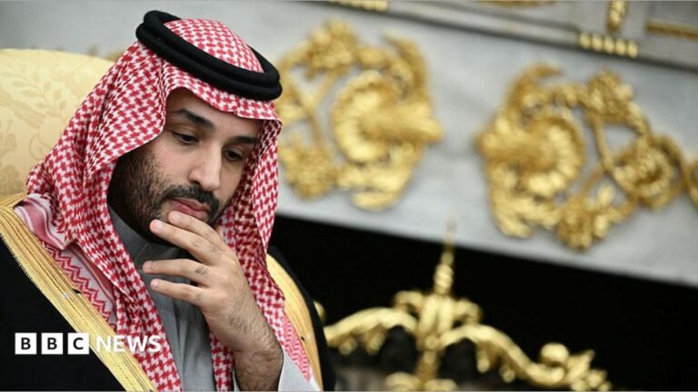 Saudi Arabia’s dilemma as it tries to stay out of US-Iran war A care worker helps a woman down a flight of stairs