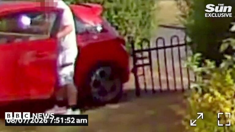 Suspect in Ann Widdecombe murder seen on CCTV getting into car with object Flowers are pictured on the ground with a police officer walking down a driveway beside