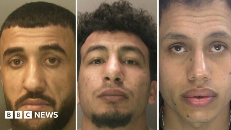 Three men jailed for Brighton beach rape A young woman looks down at her mobile phone.