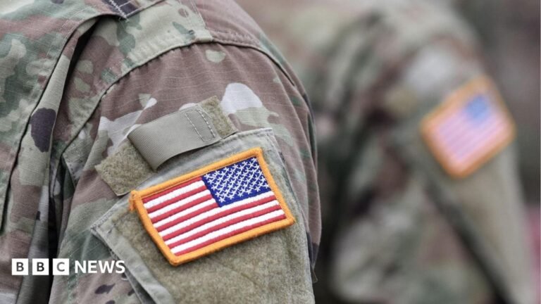 Two US troops killed and one missing after Iranian attack in Jordan A USA patch flag on the US military uniform