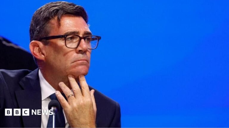 Andy Burnham says he will not vote on assisted dying unlike Starmer Andy Burnham looks pensive as he puts his hand to his chin and looks sideways.