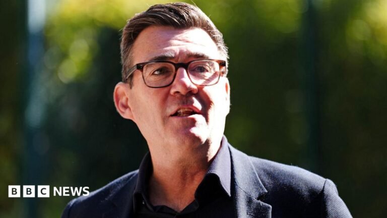 Burnham brings forward ban on ‘subscription traps’ to ease cost of living Andy Burnham wearing a dark suit and glasses.