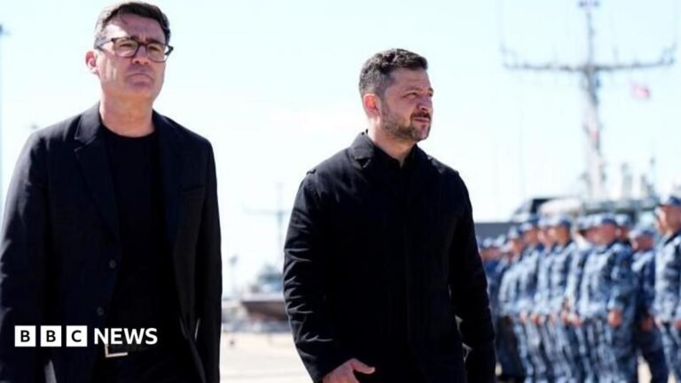 Burnham to hand long-range missile blueprints as he visits Kyiv Andy Burnham and Volodymyr Zelensky walk next to each other at a naval base. Both men are dressed in black and have short, dark hair. Burnham is wearing glasses. Military personnel can be seen in the background.