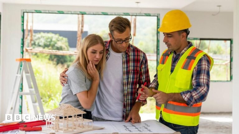 ‘Cowboy builders’ targeted in new government clampdown A couple looks at plans with a builder in their home, which is under renovation