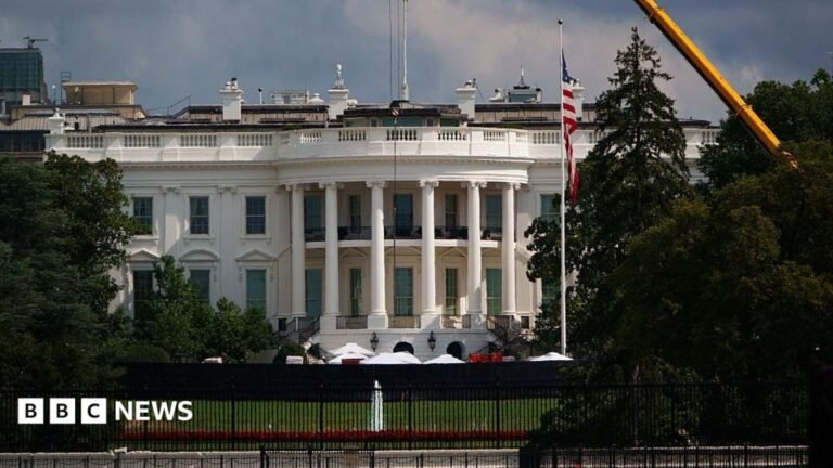 Ex-White House teleprompter operator ordered to pay $172,000 for Trump speech bets Exterior shot of the White House's South lawn, the Truman balcony (portico area enclosed by six white columns in the Ionic style, with a distinctive scroll-shaped ornaments called volutes on the capital. A yellow crane can be seen emerging from trees to the left of the frame