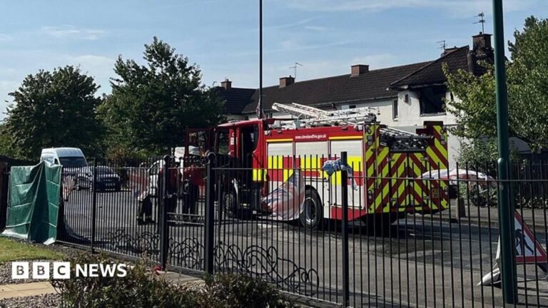 Middlesbrough murder investigation as two people die in fire A fire engine has parked outside residential homes in Middlesbrough. Fire fighters are leaving the vehicle. A black fence is lining the near side of the street before the white houses on the opposite side.