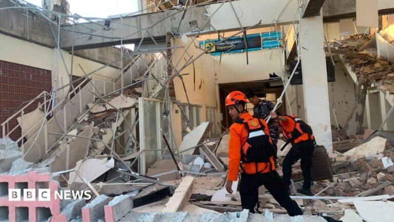 One dead after 7.7 magnitude Indonesia earthquake Emergency workers look through the rubble at Lauren Say port in Maumere