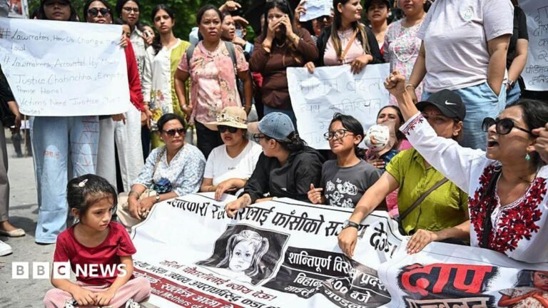 A child participates in a protest in Kathmandu, Nepal, on 22 August 2026, demanding justice for a three-year-old girl in Bara district, who was raped and killed.