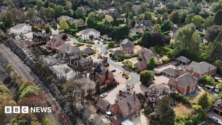 People who fled Stourbridge fires start to return home An aerial view of the devastation that wildfires have taken on an area of Stourbridge. Several houses are blackened or destroyed, with a field behind the houses completely black.