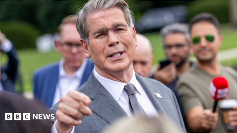 Scott Bessent urges US partners to back plans to ‘squash’ Iran economy US Treasury Secretary Scott Bessent addresses members of the media on the lawn outside the White House. He's wearing a light grey suit, white shirt and silver tie