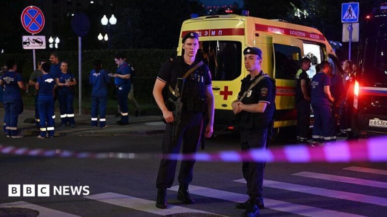 Three killed after bomb detonated at Moscow restaurant, state media say Armed Moscow police stand guard in front of an ambulance near the scene of an explosion near the centre of the city.