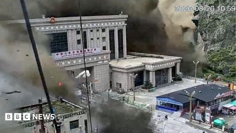 CCTV shows people running as mud and water destroys buildings in Gyirong, Tibet