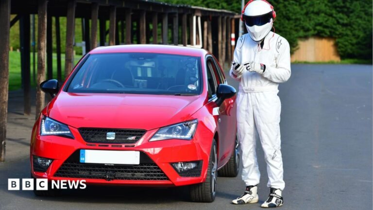 Top Gear to return after Andrew Flintoff’s crash, BBC confirms A woman, Tasha Lee Hopkins, sits on a horse pointing to her T-shirt, which reads: I love my horse. She is wearing dark blue jodhpurs, black riding boots and a black riding helmet. Her hair is tied up. She is sat on a dark brown horse that is stood in a field.