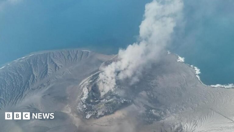 Mount Anak Krakatau spewing volcanic materials into the air following an eruption in Sunda Strait, Indonesia