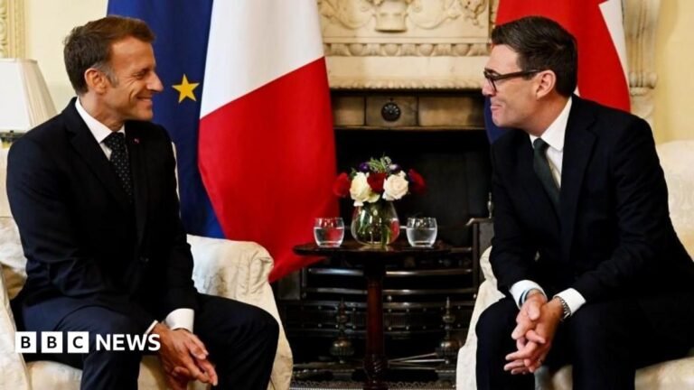 Andy Burnham praises UK-EU ties in meeting with Emmanuel Macron Thin, red banner promoting the Politics Essential newsletter with text saying, “Top political analysis in your inbox every day”. There is also an image of the Houses of Parliament.