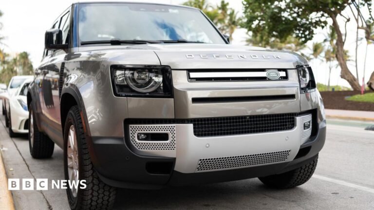 Business secretary to meet Jaguar Land Rover boss as thousands of job cuts expected A silver Land Rover Defender parked on a road