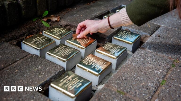 German town bans stumbling stone memorials to Nazi victims Small blocks of stone with brass on top are placed as part of a memorial on the pavement in front of houses where Jewish victims lived in Nijmegen in the Netherlands