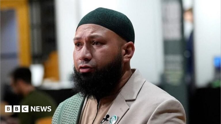 Green Party deputy leader Mothin Ali linked to property lets in Leeds Mothin Ali looking to his right, wearing a beige suit jacket with a green and white scarf draped over his right shoulder