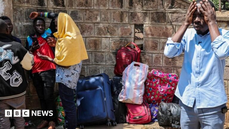 Kenya moves to register frightened Burundians as tension over foreign traders rises Burundian nationals, some with their belongings, gather at their embassy in Nairobi. A man on the right hold his hands to his face