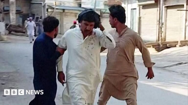 Kohat: At least 16 killed in attack on mosque in Pakistan’s Khyber Pakhtunkhwa Earl Spencer walking, wearing a navy suit and a purple tie.