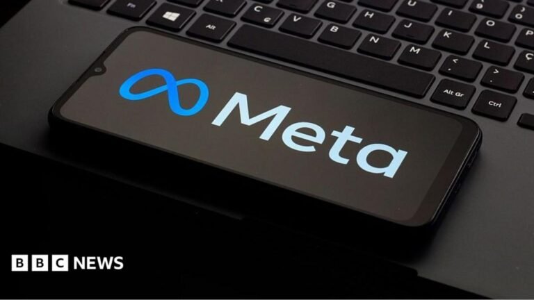 Meta continues to run ads promoting child sexual abuse material in India: report A photo of a phone kept on a laptop keyboard. The phone is displaying the logo of the company Meta