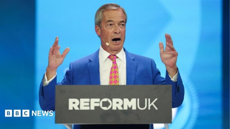 Nigel Farage threatens to overhaul Lords and judiciary in Reform conference speech Nigel Farage holds up his hands as he gives his conference speech from behind a podium with Reform UK's logo.