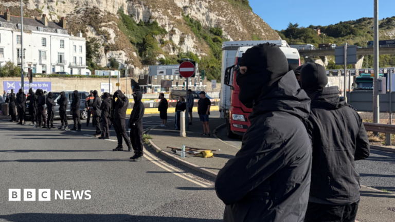 Reform UK would ban full-face coverings in public areas Black-clad and masked demonstrators blocking roads in Dover during a protest.