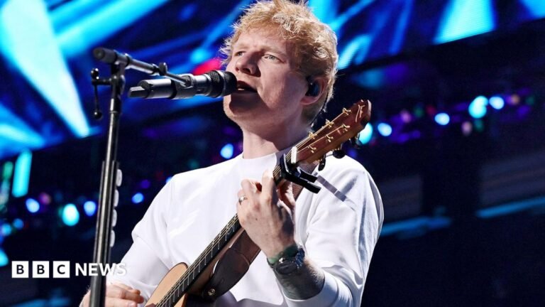 Robert Kraft says Ed Sheeran asked him to donate $2m to aid after Macklemore backlash American rapper Macklemore performs live on stage during the 5th Lollapalooza Paris Festival on July 19, 2025 in Paris, France.