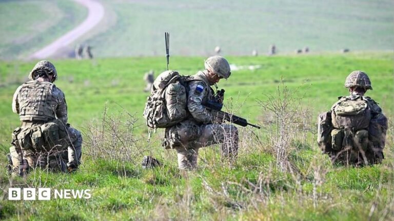 Soldiers from 16 Air Assault Brigade are seen after parachuting from a British Royal Air Force A400M transport aircraft onto Salisbury Plain at Copehill Down training facility in March 2026 as part of Joint Airborne Task Force (JATF) training launched from RAF Brize Norton.