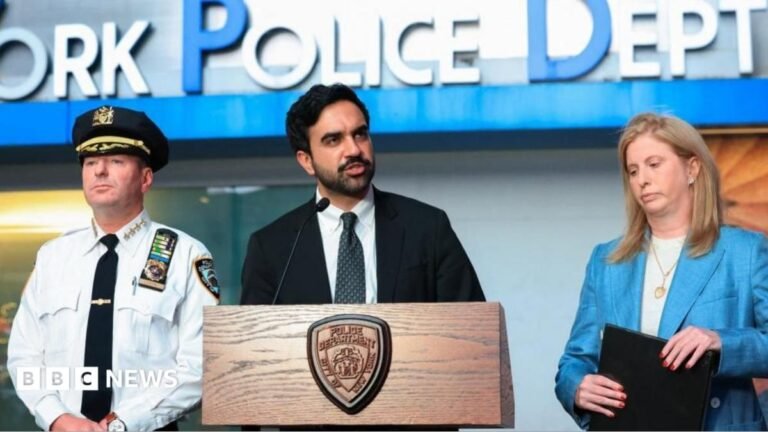 Times Square stabbing: Woman killed and suspect shot dead by police A woman with long brown hair looks at someone off-camera