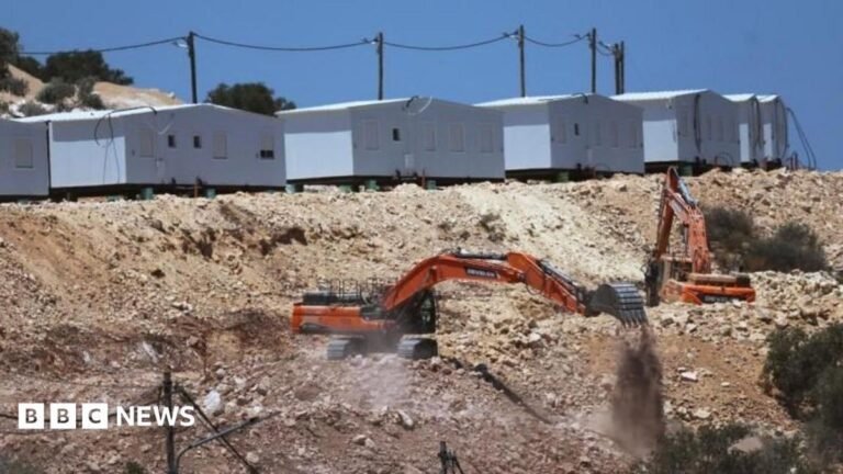 Israeli bulldozers near a new settlement in the West Bank