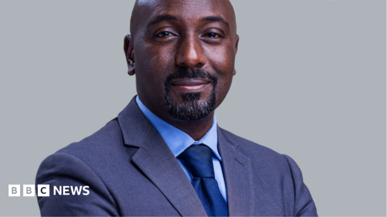 Uganda’s King Oyo death: Royal family rejects UBC presenter Edward Rukidi Kijanangoma as the new monarch Edward Rukidi Kijanangoma wearing a dark suit and tie smiling