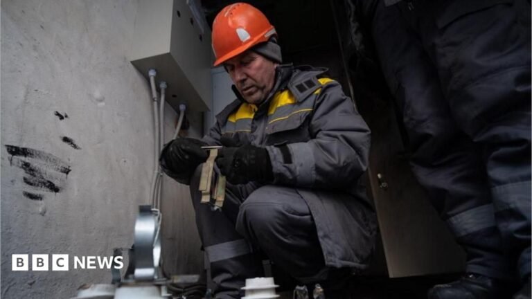 Workers from the Ukrainian energy company DTEK perform repairs at an electrical substation in Kyiv, Ukraine, 21 January 2026, amid the Russian invasion.