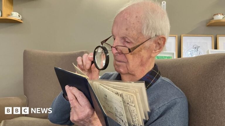 Watford artist, 94, thrilled by House of Commons exhibition A close-up photograph of a framed hand-drawn sketch and handwritten memoir displayed behind glass. The drawing includes several handwritten captions: “Memories of Blackpool”, “1940-45”, “2nd World War”.