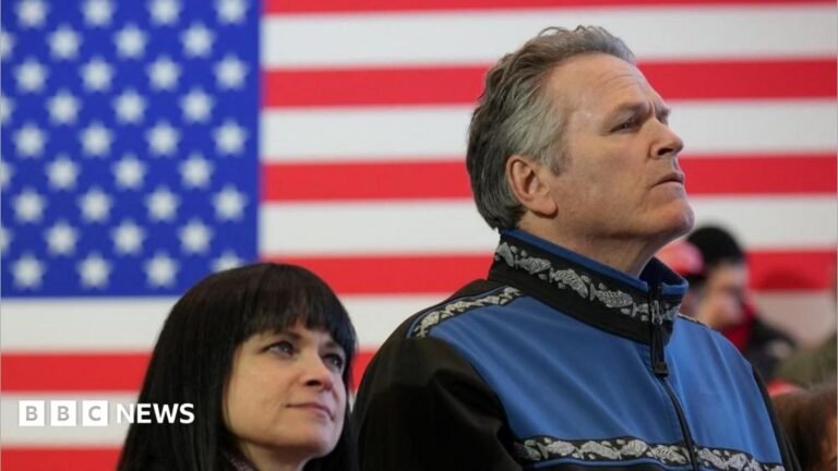 Alaska governor orders probe into Democratic campaign’s alleged links to same-name candidate File image of Governor Mike Dunleavy standing in front of a US flag at an event